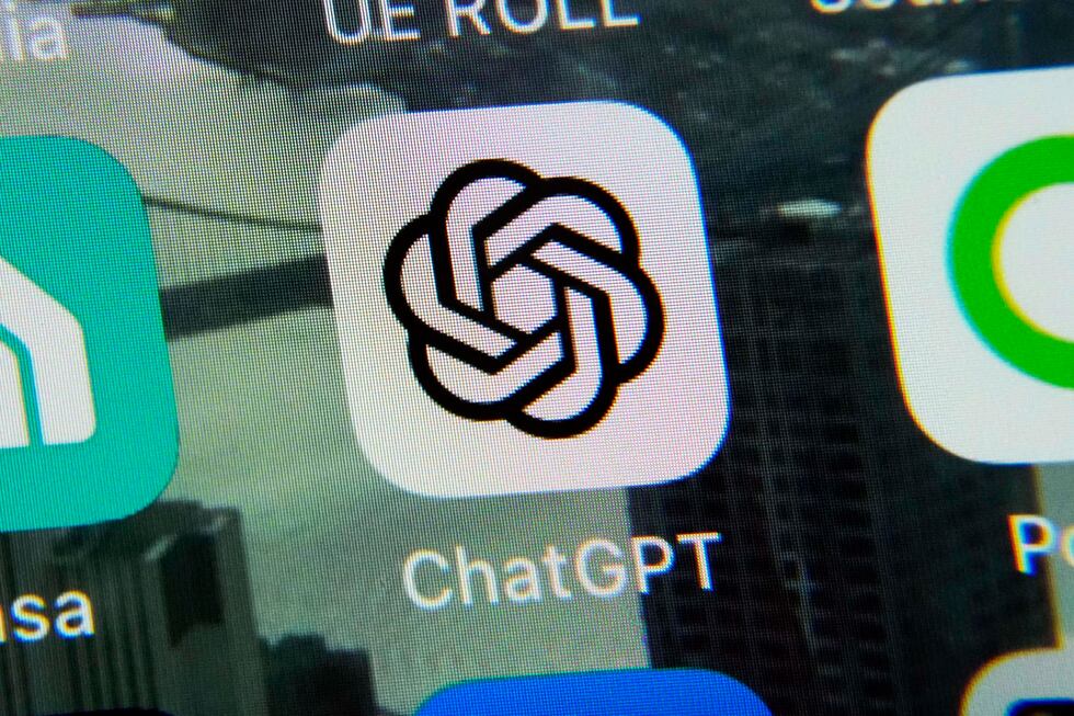 FILE - The ChatGPT app is displayed on an iPhone in New York, May 18, 2023.A judge is deciding...