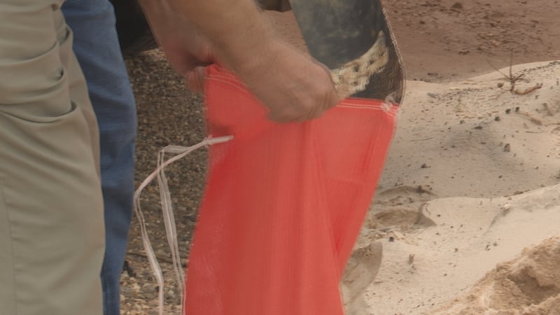 City provides sandbags, shovels, and sand behind old public works facility.
